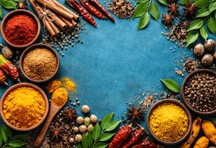 Bowls of cinnamon, chilli, turmeric and whole spices